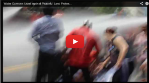 water cannons used against peaceful land protest
